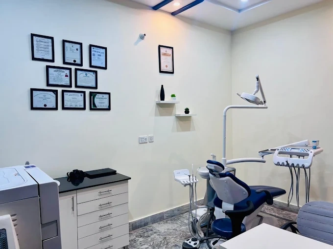 The actual treatment room at Brace Align Dental Care, with a dental chair and wall certificates